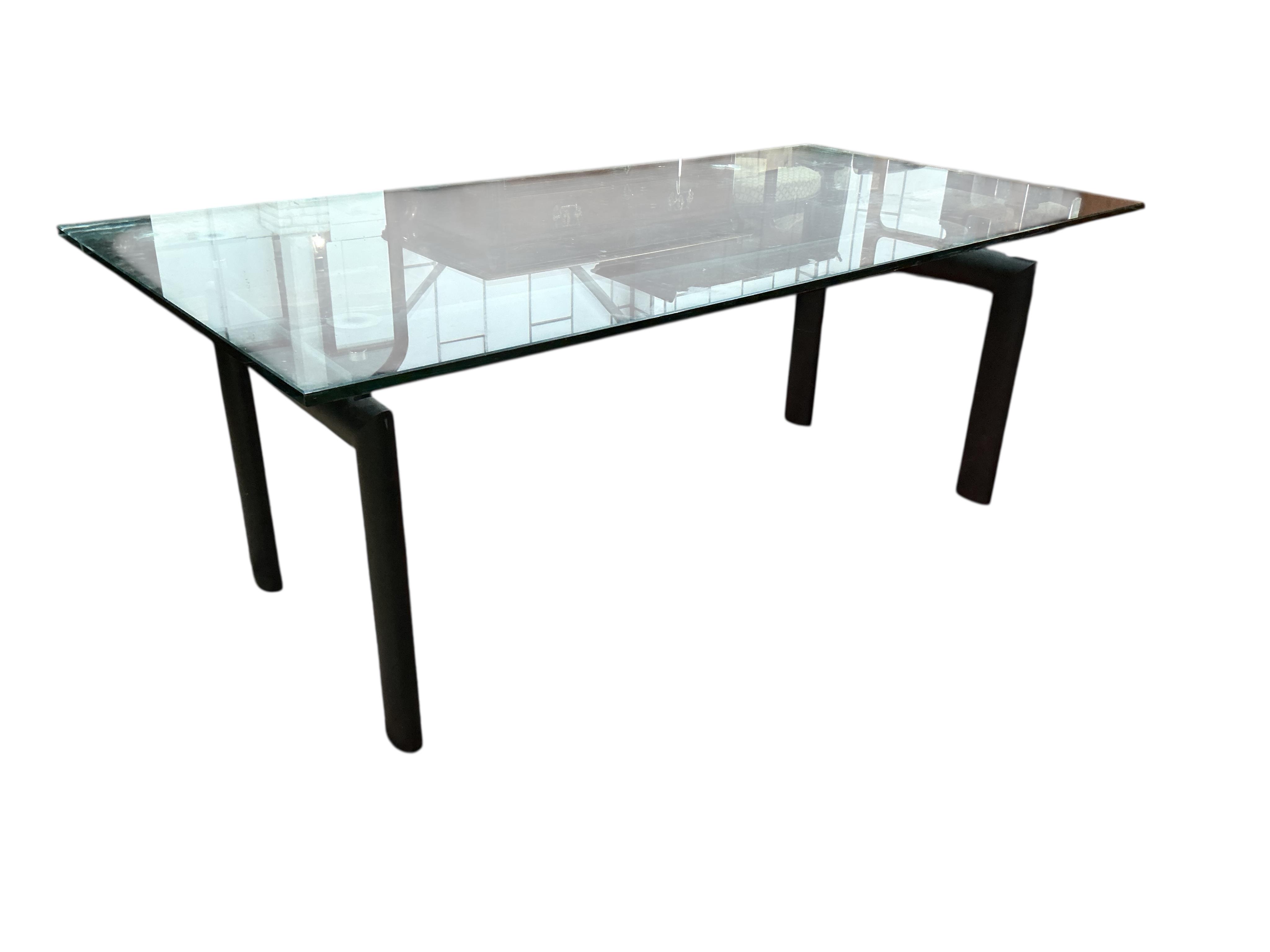 A Corbusier design LC6 style dining table with a glass top, width 200cm, depth 100cm, height 72cm